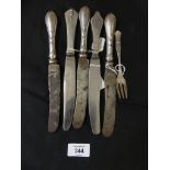 A selection of Danish silver flatware, to include five silver handled knives and a fish fork