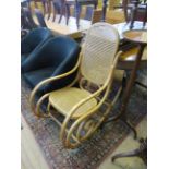 A modern Bentwood and rattan rocking chair