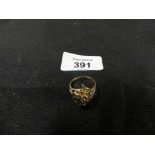 A dress ring Designed as a rose, with tapered foliate shoulders, ring size P, weight approx. 4.9g.