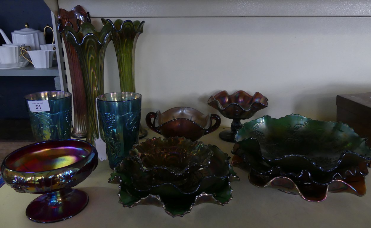 A large collection of Carnival glass, to include three flared lip vases, a pair of blue tinted