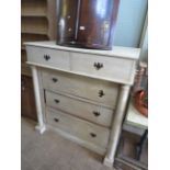 A painted pine Scotch style chest, with two short and three long drawers of pillared side supports