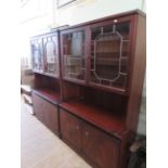 A pair of modern mahogany glazed display cabinets