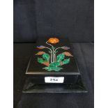 A modern inlaid hardstone box decorated with a poppy, together with a similar dish (2)