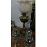 A mixed lot comprising a brass oil lamp with opaque glass shade, a clear glass decanter and pair