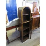 An early 20th Century arched oak open bookcase