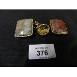 Two agate brooches and a citrine fob The agate brooches each designed as a rectangular agate panel