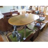 A reproduction mahogany single pedestal centre table