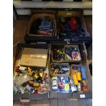 Four boxes of various assorted model railway rolling stock, track, toy cars and other vehicles