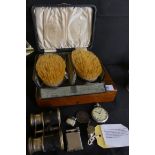 A mixed lot comprising two silver backed hairbrushes, cased silver-plated fish cutlery, vintage