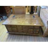 A contemporary hardwood hinged box coffee table