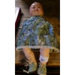 A German bisque headed 'My Dream Baby' style doll With moulded hair, open/shut blue eyes, open