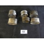 Six various assorted silver napkin rings