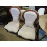 A pair of Victorian mahogany framed balloon back parlour chairs and a pair of early 20th Century