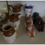 A mixed lot comprising a graduated set of three stoneware jugs, a camel china (Noritake) double