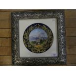 A 19th Century Continental cabinet plate Decorated with a central painted panel of a castle in