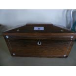 A Victorian sarcophagus formed tea caddy, decorated with mother of pearl inlays, the interior with