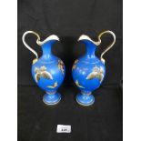 A pair of Noritake butterfly decorated jugs CONDITION REPORT Both damaged One on the handle One on