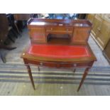 A reproduction mahogany ladies writing desk