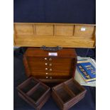 A cased Mahjong set together with accompanying wooden tile stand