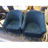 A pair of contemporary black velour tub chairs