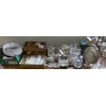 A large collection of silver-plated items to include cruet set, epherne vase, egg cruet, various