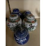 A mixed lot of five various Chinese ginger jars, three decorated in blue and white with Prunus