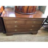 An Edwardian inlaid mahogany chest of drawers, two short over two long drawers