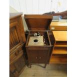 An early 20th Century oak gramophone cabinet.