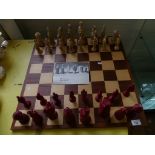 A modern Camelot chess set and board