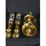 A pair of brass wall mounted candle holders marked GNER, together with a further pair of brass