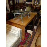 A Marks and Spencer light oak rectangular dining table and six accompanying chairs (7)