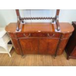 A good quality Regency style mahogany sideboard by Maitland-Smith applied with gilt metal swag swing