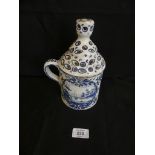 A unusual Delft chamberstick type candle holder of architectural form, with pierced lid and panels