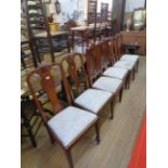 A set of four early 20th Century Queen Anne style walnut dining chairs and a pair of walnut Art