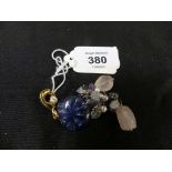 A Lalique 'Bonheur' charm The blue glass flower, suspending a vari gem drop, flower signed