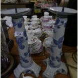 A pair of large modern blue and white decorated candlesticks