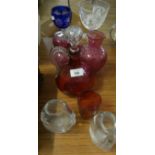 A mixed lot of glassware comprising a large cut clear glass goblet, various cranberry glass items