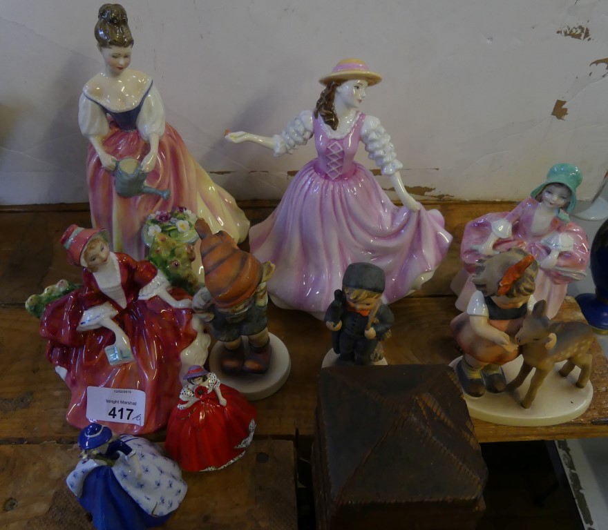 A mixed lot comprising three small Goebel figures of children, together with Royal Doulton figurines