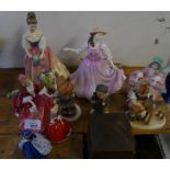 A mixed lot comprising three small Goebel figures of children, together with Royal Doulton figurines