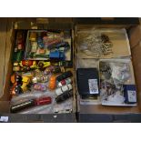 Two boxes containing various diecast model soldiers, assorted toy vehicles and other items