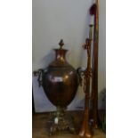 A 19th Century copper and brass samovar together with two copper post horns (3)