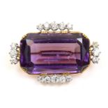 An amethyst and diamond brooch The rectangular shaped amethyst with graduated circular cut diamond