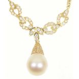 A cultured pearl and diamond necklace The cultured pearl drop with a brilliant cut diamond cap,