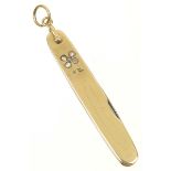 A diamond pen knife The folding pen knife with rose cut diamond foliate accent and monogram to the