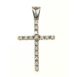 A diamond cross pendant The brilliant cut diamond cross with a tapered surmount, estimated total