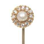 A split pearl and diamond stickpin Designed as a split pearl and old cut diamond cluster, may also
