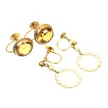 Two pairs of gem set earrings To include a pair of 9ct gold citrine earrings, together with a pair