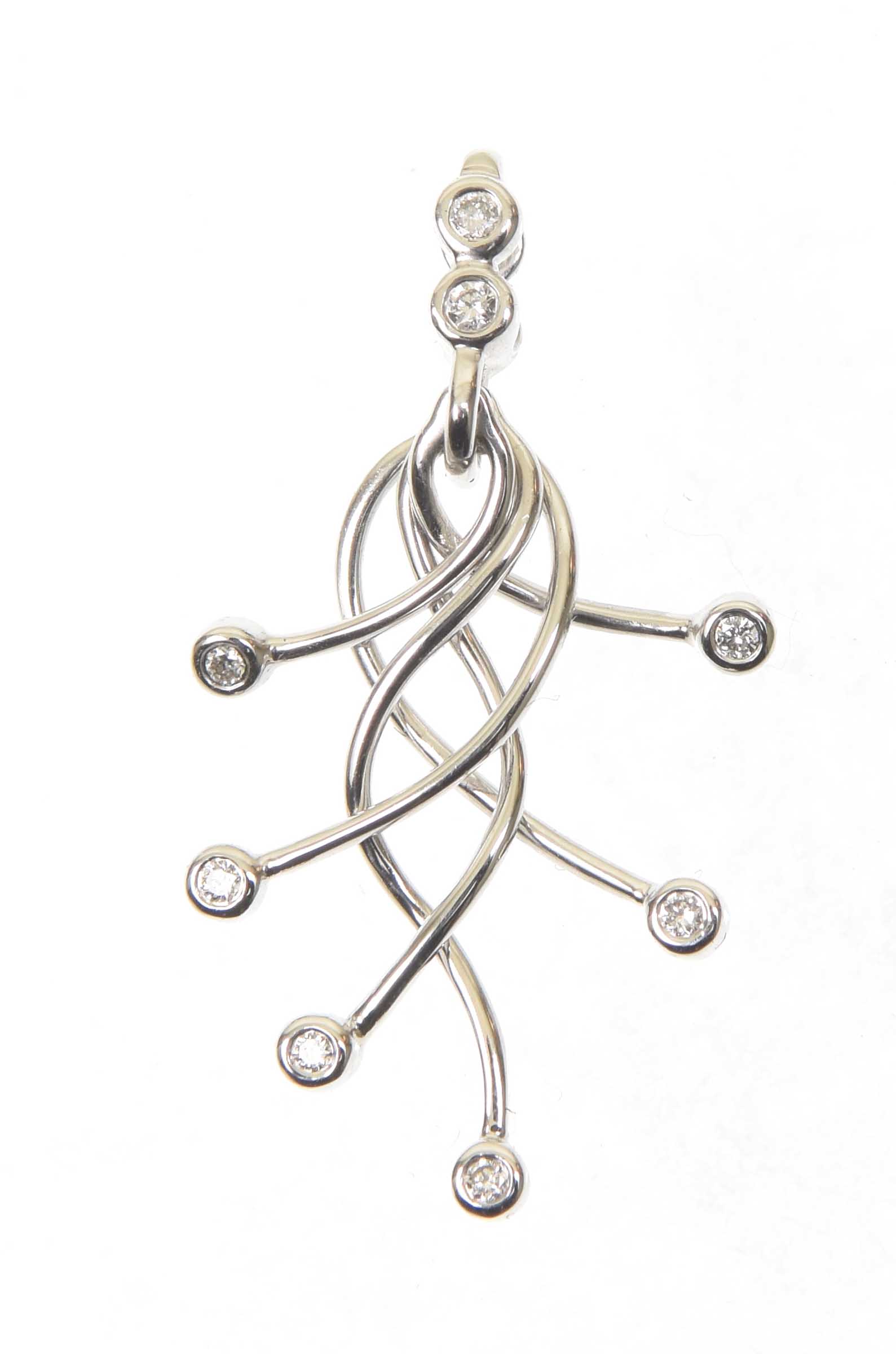 An 18ct gold diamond pendant The six brilliant cut diamond collet terminals suspended from a