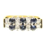 A 1970s 18ct gold sapphire and diamond dress ring Designed as a series of circular shape sapphire