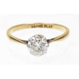 A diamond single stone ring The brilliant cut diamond within an eight claw setting and tapered